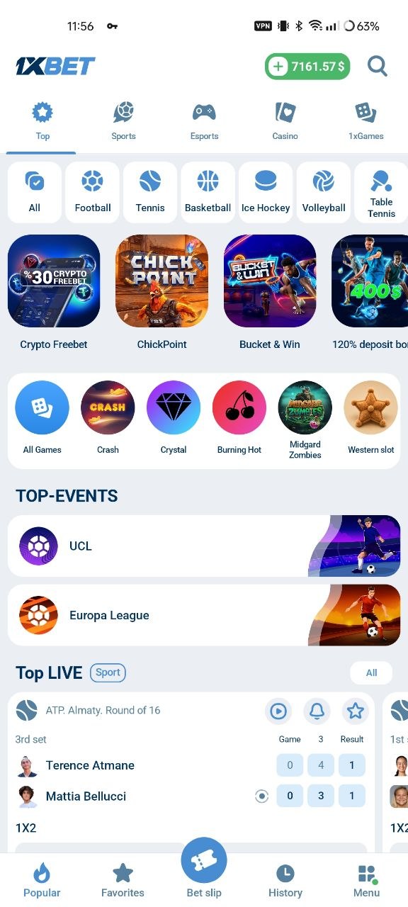 Onglet Top de l’application 1xBet : filtres par sport, promotions, jeux rapides, grands événements et matchs en direct.